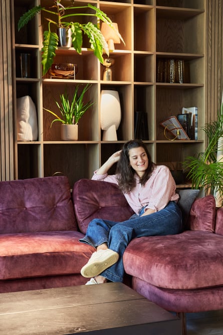 Marisa Cannon sitting on a comfortable sofa