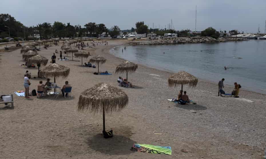 A beach in Glyfada, Greece. The UK government is expected to confirm where and when leisure travel will be allowed.