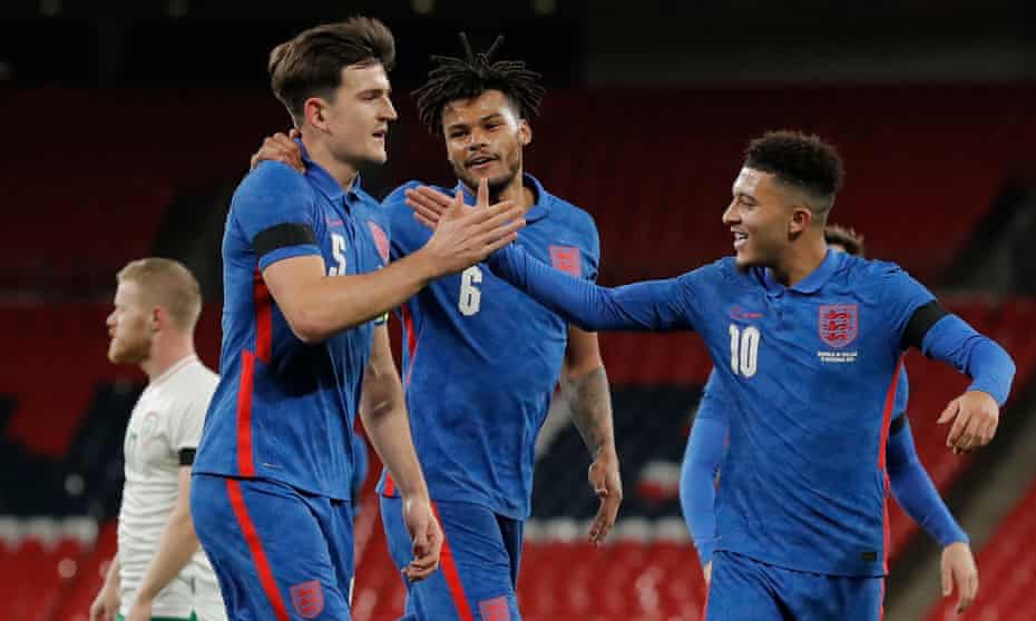 Harry Maguire celebrates with Tyrone Mings and Jadon Sancho after scoring England’s opening goal against Republic of Ireland.