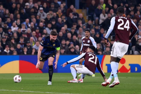 Olivier Giroud is caught by Douglas Luiz.