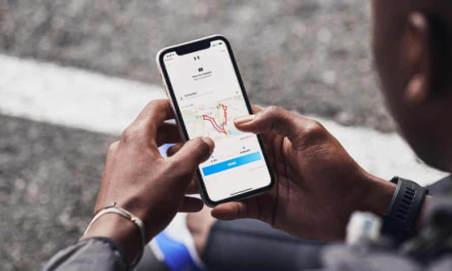 A man using the MapMyRun app on an iPhone.