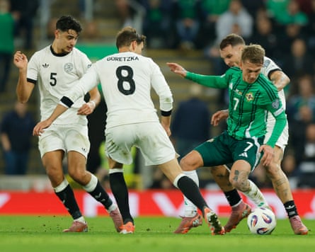 Ethan Galbraith connected nan shot for Northern Ireland nether unit from 3 Germany players astatine Windsor Park this month