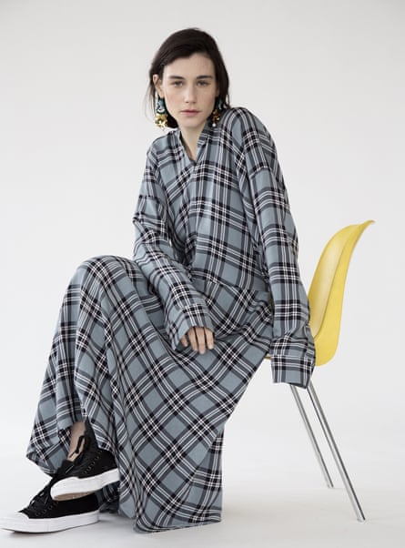Sara Lanzi’s check chemisier, worn with embroidered earrings.