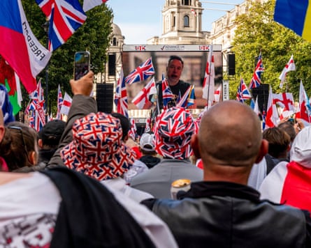 Elon Musk addresses crowds at the Unite the Kingdom rally organised by the rightwing activist Tommy Robinson in London.