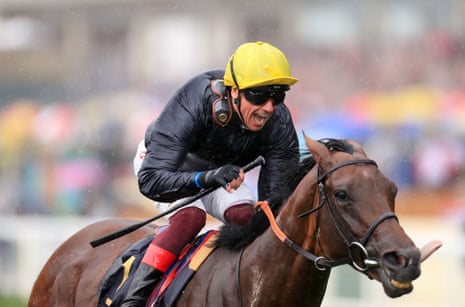 Crystal Ocean ridden by jockey Frankie Dettori wins the Prince of Wales’s Stakes.