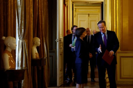 David Cameron, the foreign secretary, with the French foreign and European affairs minister Catherine Colonna arriving for a press conference at Quai d'Orsay in Paris this morning.