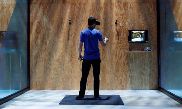 An attendee tries the new Facebook Spaces virtual reality platform during the annual Facebook F8 developers conference in San Jose, California.