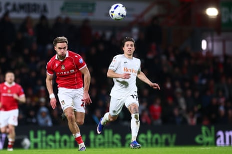 Sam Smith and Gonçalo Franco chase down the ball.