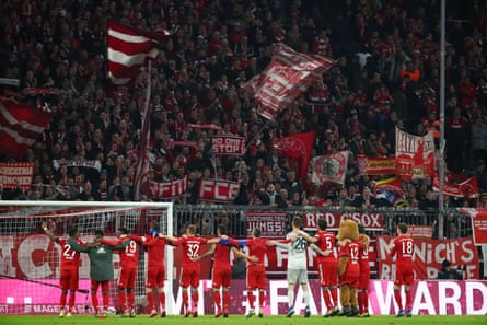 Bayern Munich players celebrate winning against Schalke.