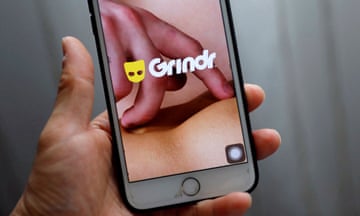 The Grindr app is seen on a mobile phone
