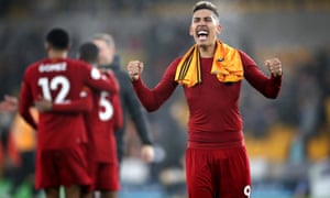 Liverpool’s Roberto Firmino celebrates after their win.