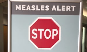 A sign at a clinic in Vancouver, Washington, warns of a measles outbreak. 2658.jpg?width=300&quality=85&auto=forma
