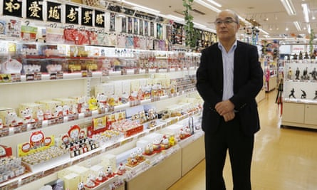 Hideyuki Abe looks around his shop in Tokyo's Akihbara electronics district