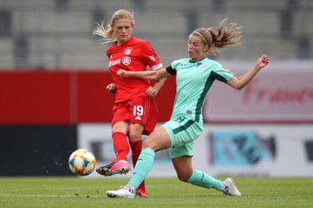 Carina Wenninger battles for the ball with Tabea Wassmuth of TSG 1899 Hoffenheim during the Frauen Bundesliga match in May.