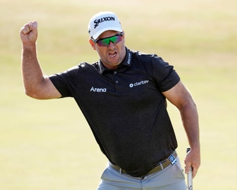 Ryan Fox of New Zealand celebrates a birdie put on the 18th to win The 154th Open Championship.