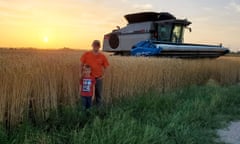 Daniel Kelly and his son in front of Kansas farm