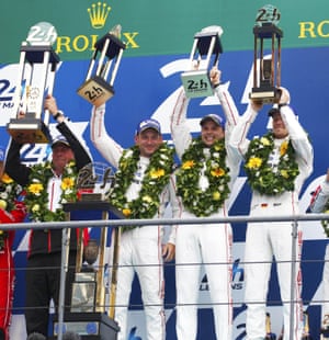 The winning drivers, (left to right) Nick Tandy, Earl Bamber and Nico Hulkenberg, take their trophies and the acclaim of the crowd on the podium ater a hard-fought race.