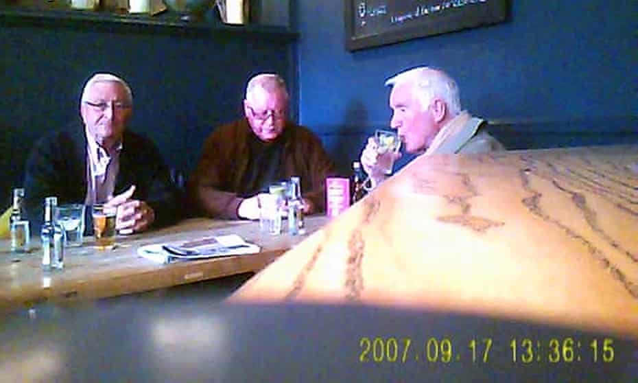 A still image from a police surveillance video showing John Collins, Terry Perkins and Brian Reader in the Castle public house, London.