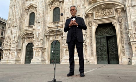 Italian opera singer Andrea Bocelli rehearsing in an empty Duomo square on Easter Sunday ahead of a livestreamed concert inside the empty Duomo cathedral.