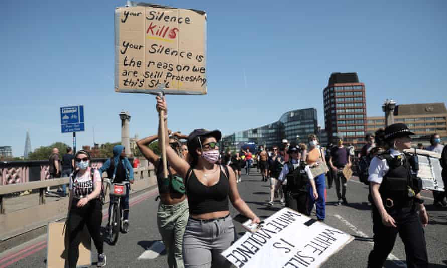 Protesters take part in a demonstration on Monday in London.