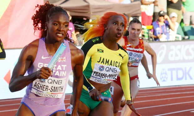 Britain's Dina Asher-Smith and Jamaica's Shelly-Ann Fraser-Pryce in the 4x100m relay final at the world championships