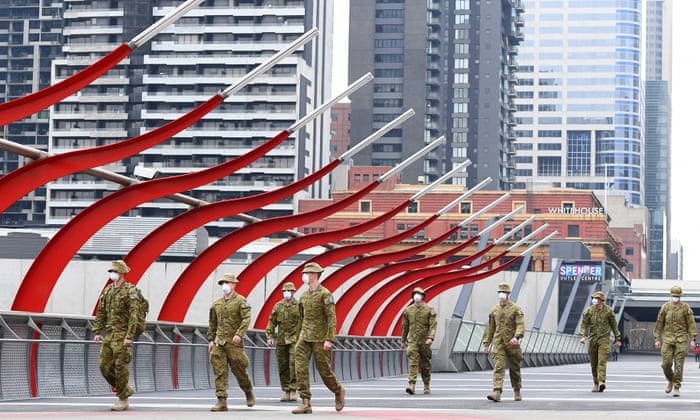 Members of the Australian Defence Force walk through Melbourne, Australia.