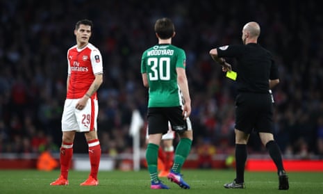 Granit Xhaka is booked for a crude tackle during Arsenal’s FA Cup tie against Lincoln City; since the midfielder returned from suspension in February he has played in five matches and been booked in each.