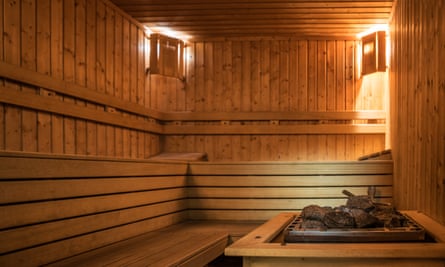 The interior of a traditional wooden sauna.