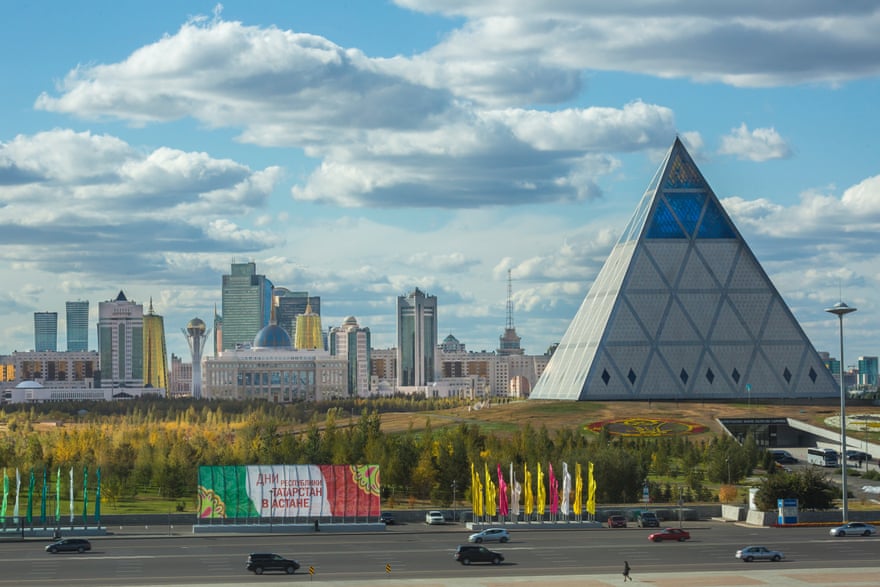 Foster’s Palace of Peace and Reconciliation pyramid, with the city of Astana behind.