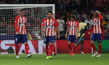 Atletico Madrid’s Fernando Torres and Nicolas Gaitan look dejected after Michy Batshuayi scored their second goal