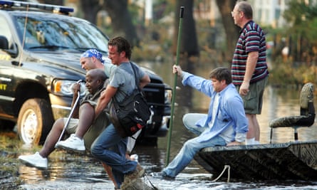 Sean Penn rescuing survivors of Hurricane Katrina 