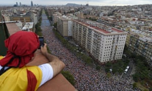 A man takes pictures of Meridiana Avenue during pro-independence demonstrations by Catalans in Barcelona.