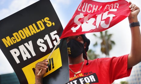 McDonald's workers and labor activists protested to demands the company pay at least $15 an hour.