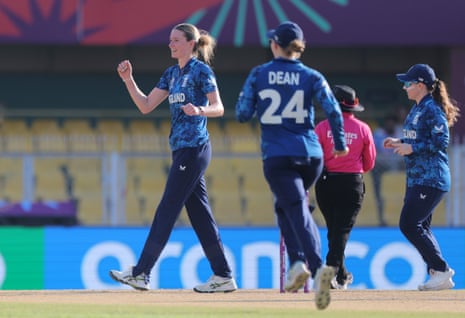 Lauren Bell celebrates taking the wicket of Jhelik