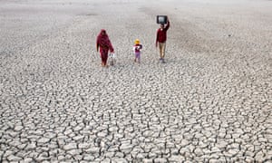 Villagers on dried river bed in Satkhira, Bangladesh.