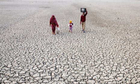 Villagers walking on a dried riverbed in November 2015 in Satkhira, Bangladesh, one of the world’s most vulnerable countries to climate change