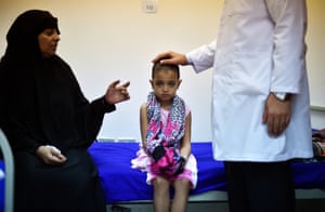 Farah Abdallah, a seven-year-old Yemeni refugee, sits in hospital in Djibouti on 5 May 2015