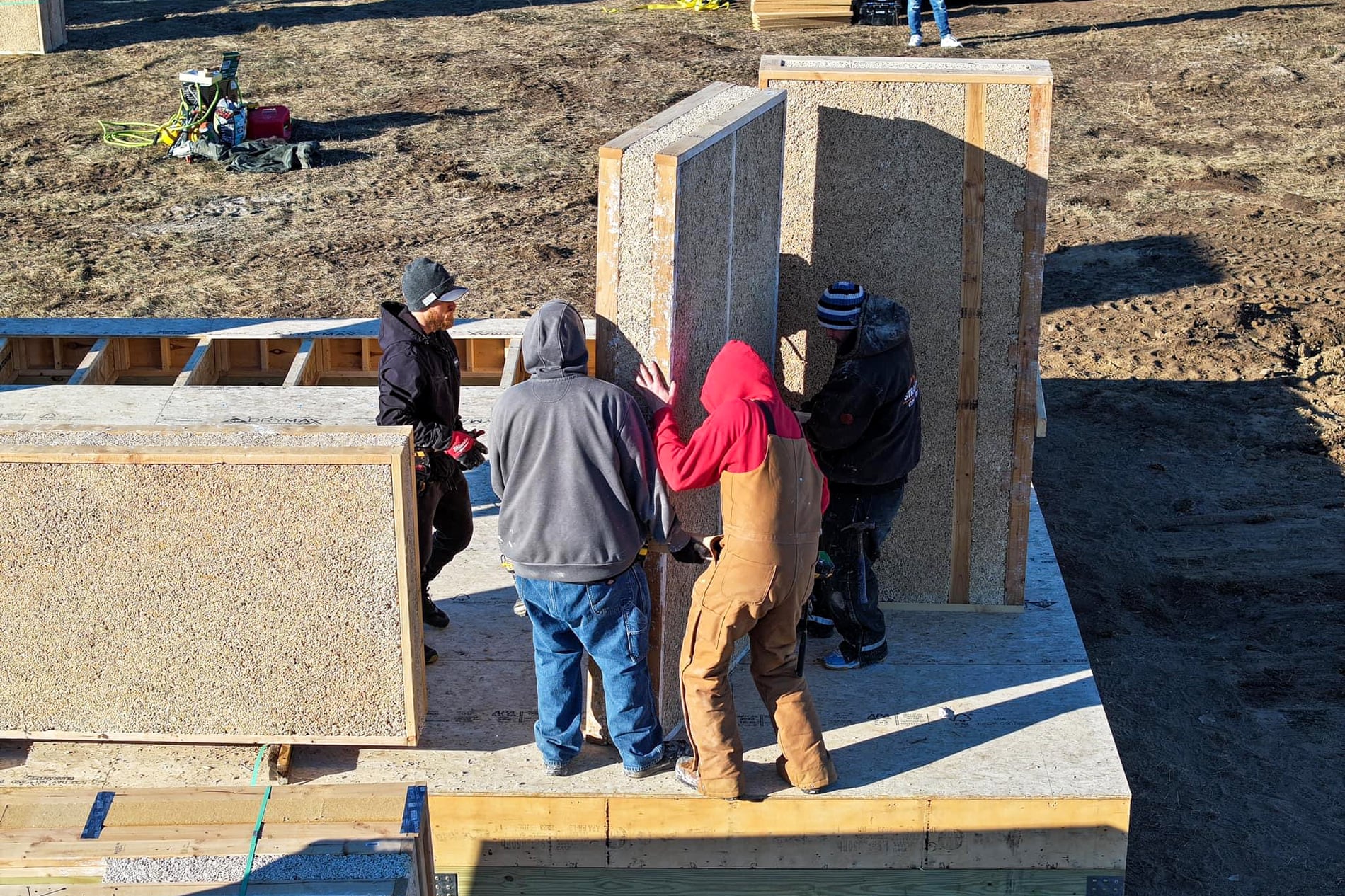 The Lower Sioux construction crew placing a prefabricated hempcrete wall panel, which weighs approximately 700lb. Photograph: Lower Sioux Industrial Hemp Project