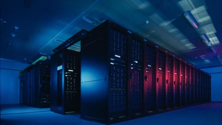 Shot of datacentre with multiple rows of fully operational server racks