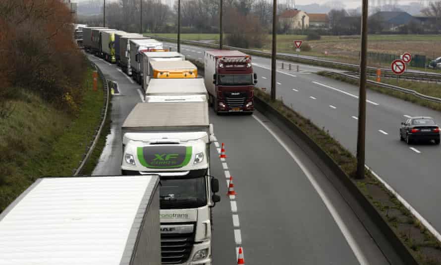 Lorries queue along the A16 motorway to board ferries and access the Eurotunnel