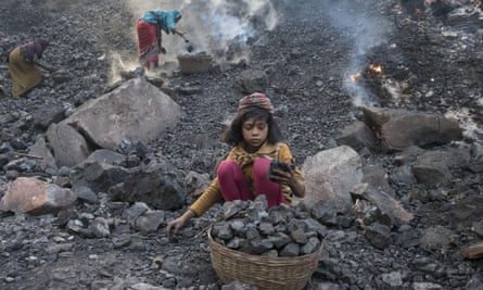 A child labourer at an opencast coalmine in India