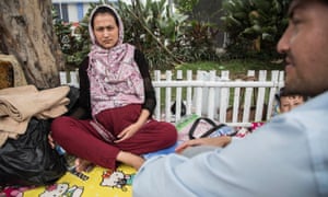 Asylum seekers waiting to get inside the immigration detention centre