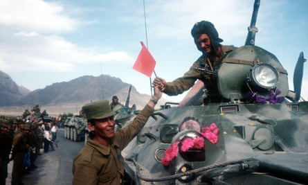 Soviet troops withdraw from Kabul in May 1988.