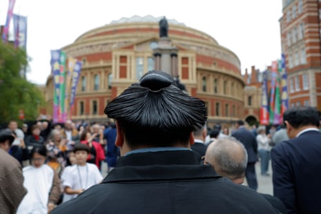 A rikishi, wearing the traditional topknot hairstyle called the oicho, which is shaped like a ginkgo leaf, and is reserved for higher-ranking rikishi