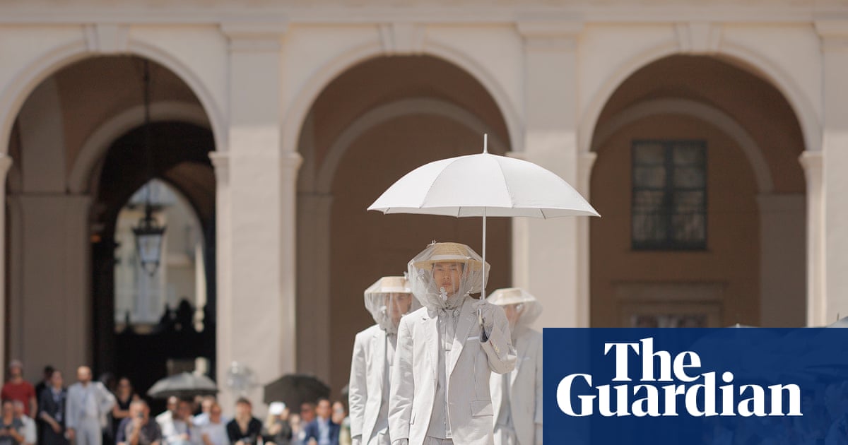 Behold the sunbrella, fashion’s stealth accessory for a heatwave