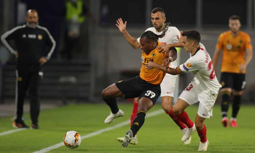 Watched by the then Wolves manager Nuno Espírito Santo, Sergio Reguilón tackles Adama Traoré during Sevilla’s Europa League quarter-final in August 2020