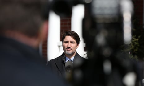 The Canadian prime minister, Justin Trudeau, speaks during a news conference on the Covid-19 situation from his residence in Ottawa where he is self-isolating on Monday.