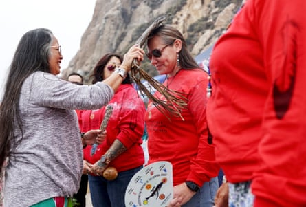 Supporters prepare for a rally held by the Northern Chumash Tribal Council at the base of Morro Rock.