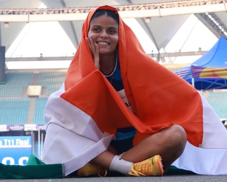 Simran Sharma celebrates her T12 200m silver medal