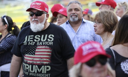Jorge Alfonso, 56, of Miami, waits in line outside the King Jesus International Ministry church before a Trump campaign event in Miami in 2020.